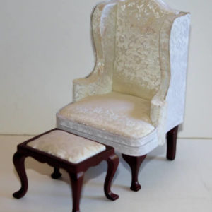 Cream silk wing back chair and stool